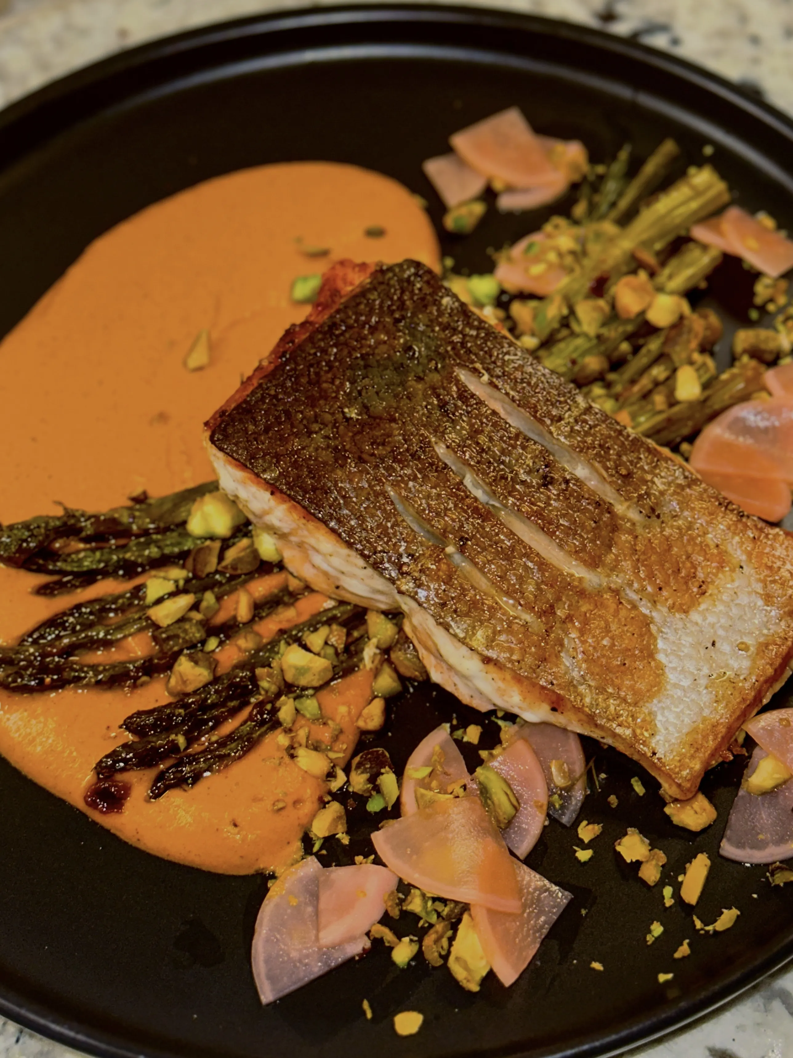 Pan Seared Salmon with Romesco Sauce and Calabrian Chilies